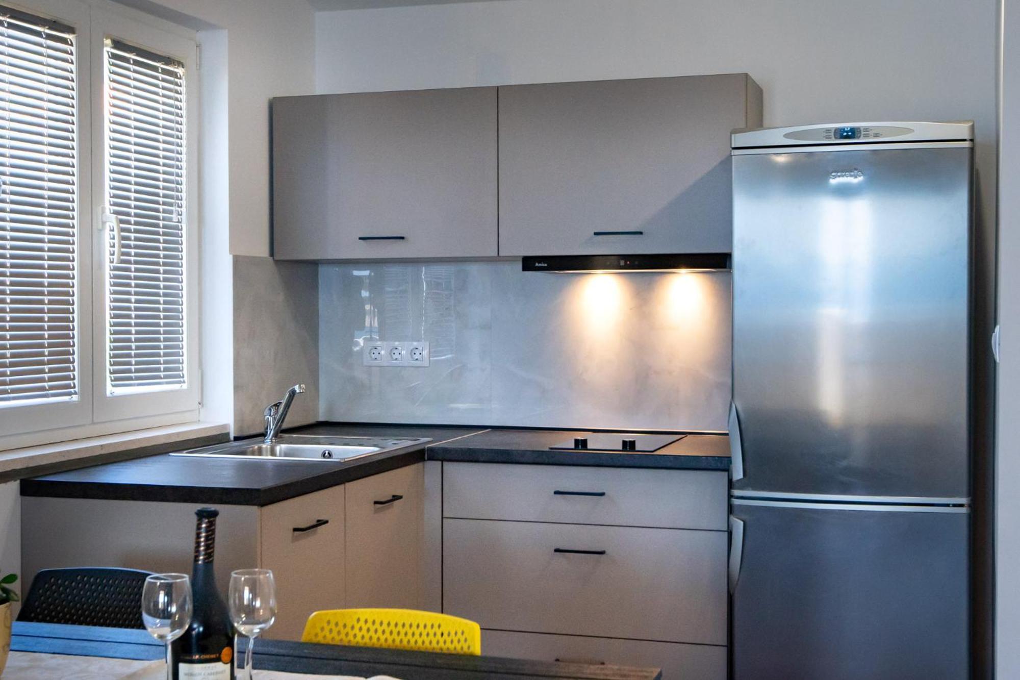 Apartments & Rooms Fam Ribaric Banjol ภายนอก รูปภาพ